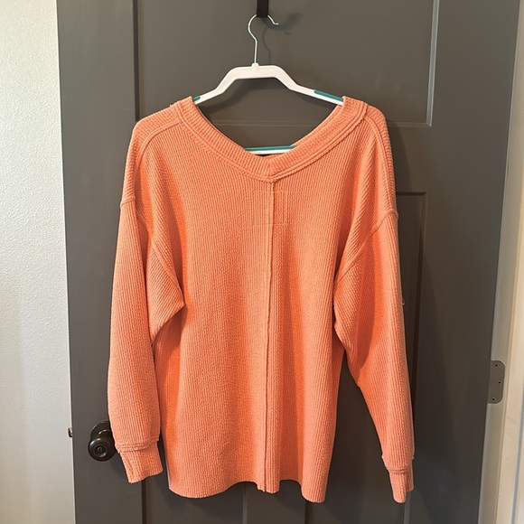 Aerie v-neck/off the shoulder oversized sweater in a peach color. - Picture 2 of 2